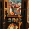 Mostek Pokutnic we Wrocławiu – zbliżenie na punkt widokowy między wieżami katedry, efekt tilt-shift, czerwony dach, rozmyte tło miasta
